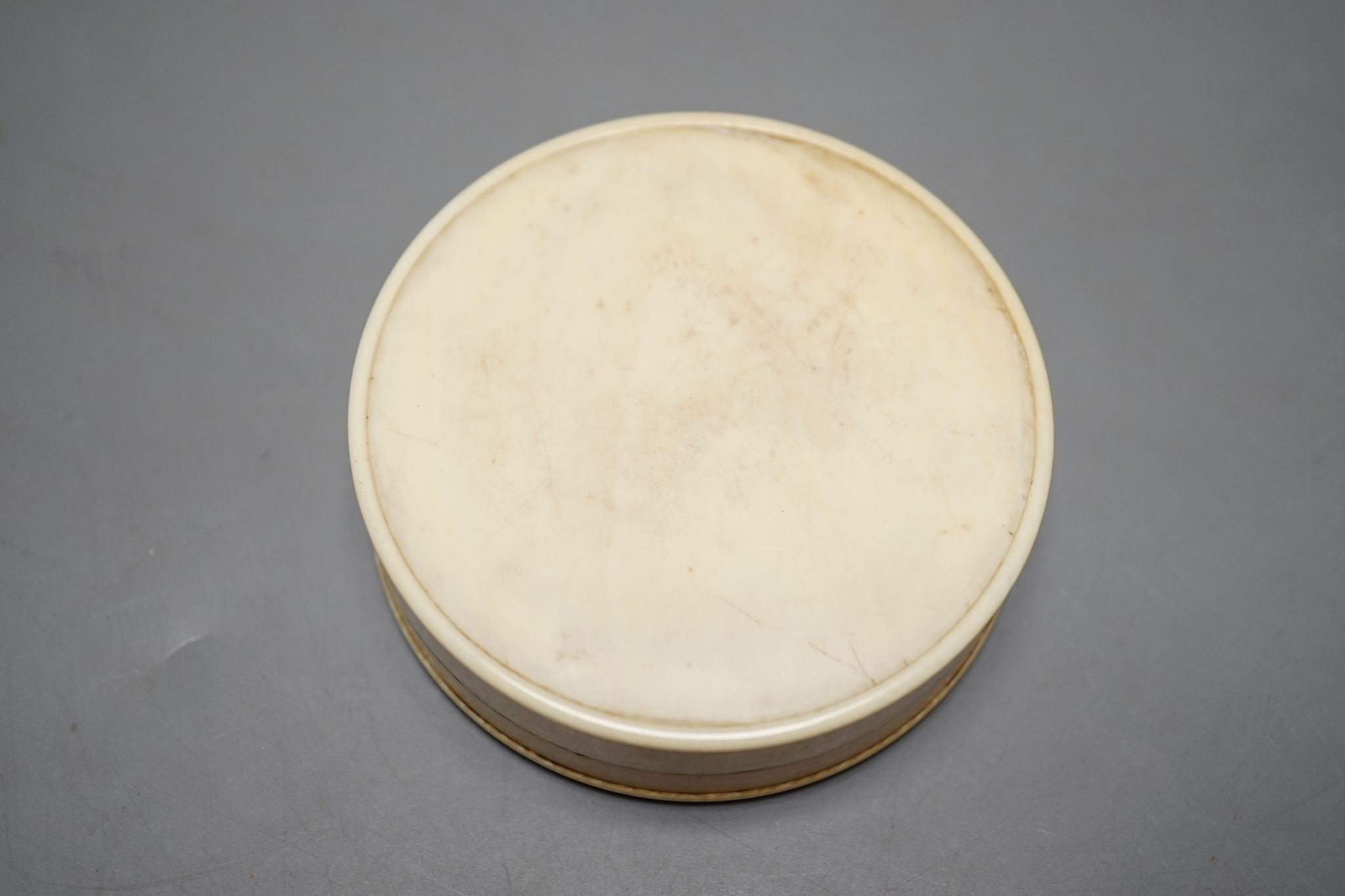 An early 19th century ivory and tortoishell box with inset miniature of Themis to cover, 8cm.